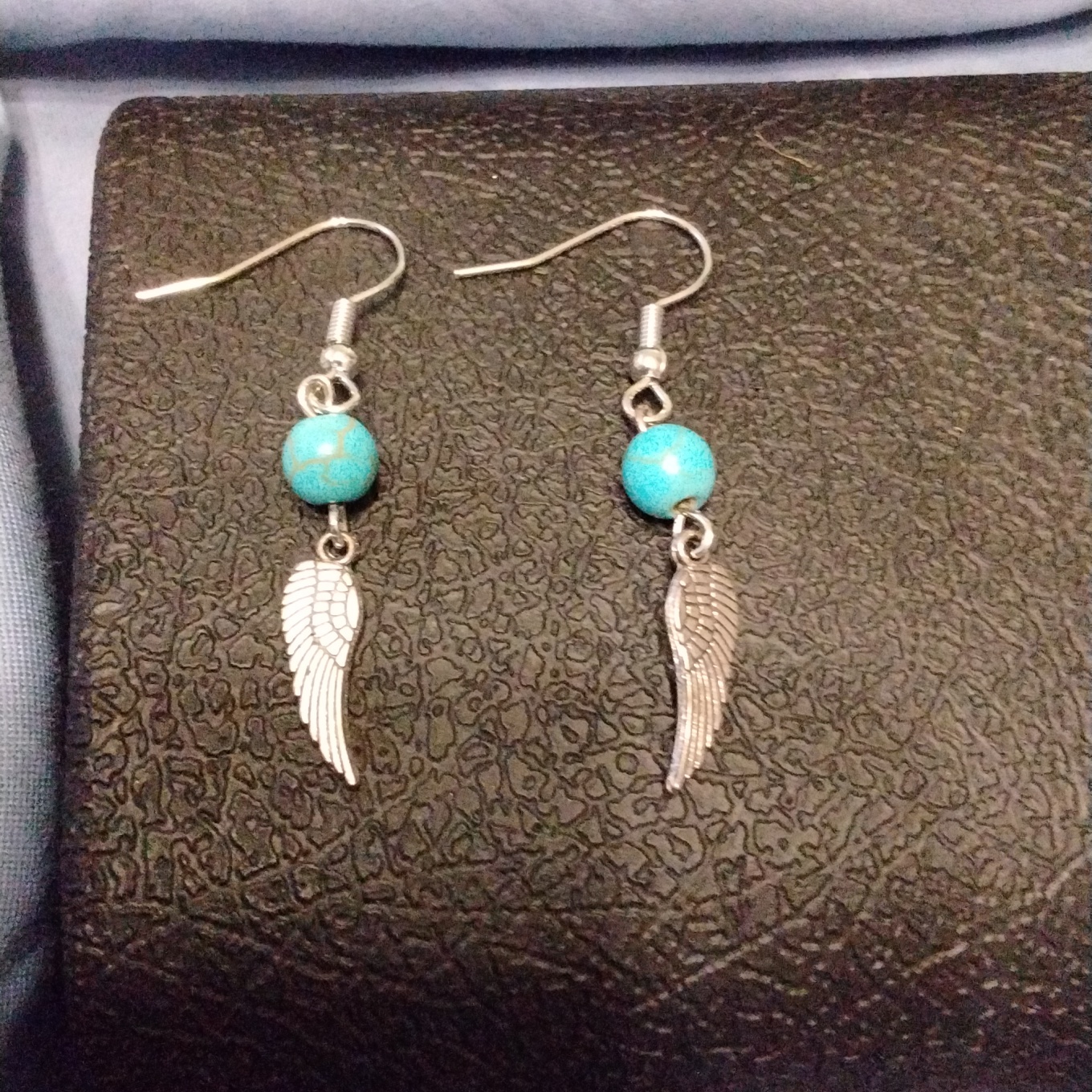Womens Turquoise Wing Charm Silver Tone Earrings Nip 12$